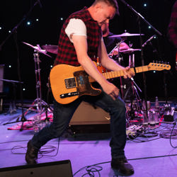 Darren The Boss Giving The Guitar a good strum in born in the USA by Bruce Springsteen