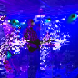 The band on stage playing the ties that tribute band playing The Ties That Bind by Bruce Springsteen